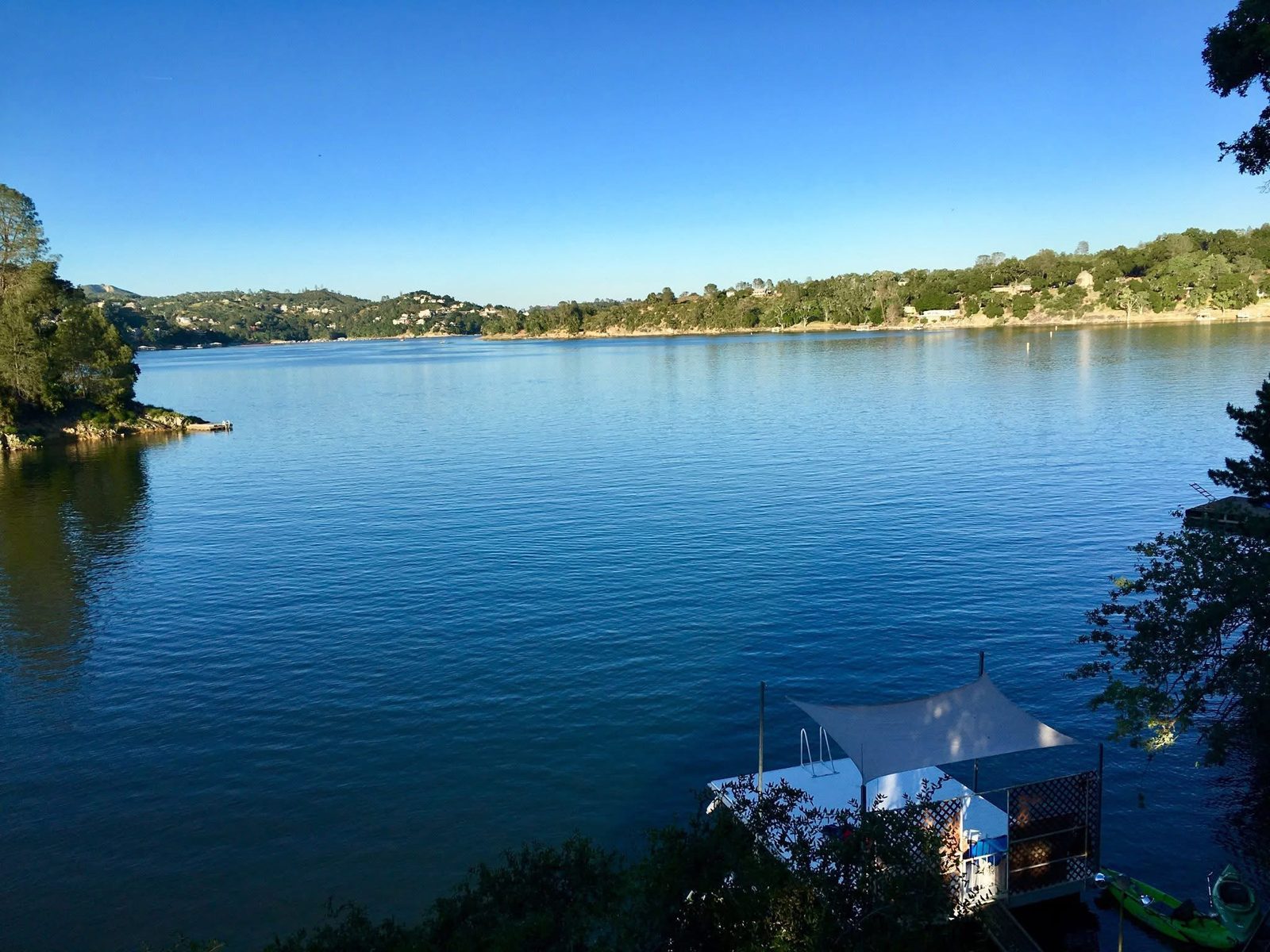 Blue lake view with covered dock