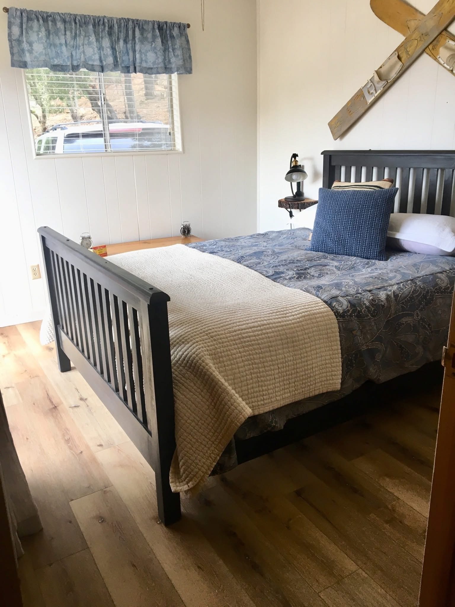 Bedroom with dark wood bed frame