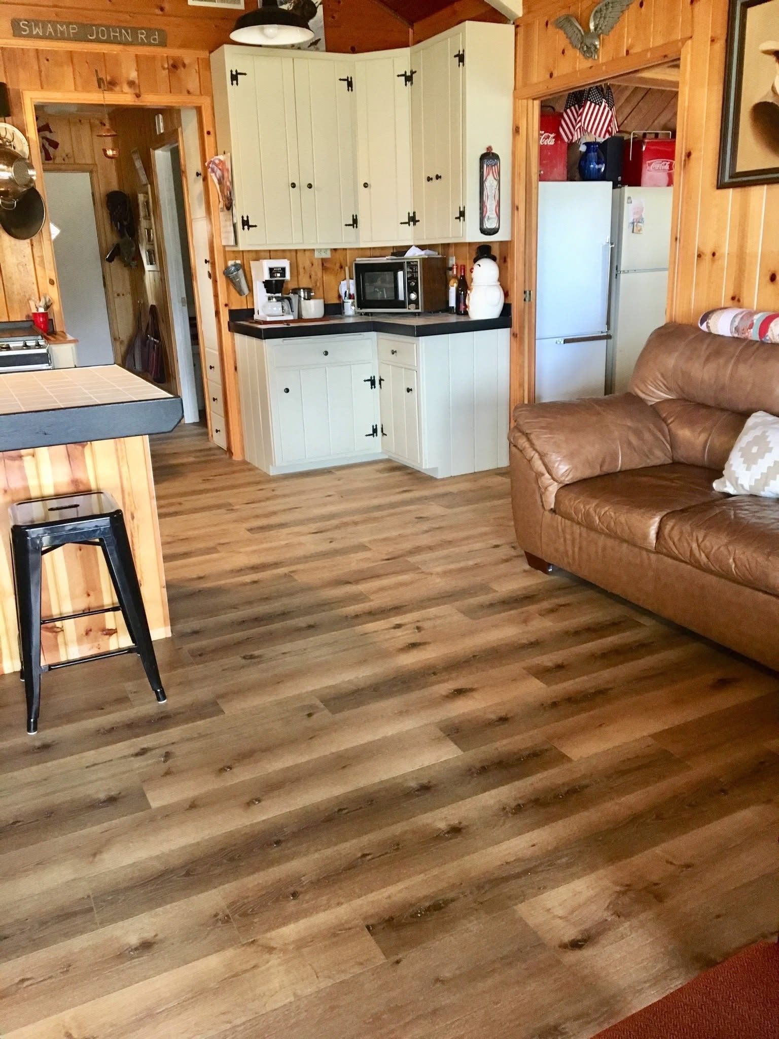 Knotty pine kitchen and living area
